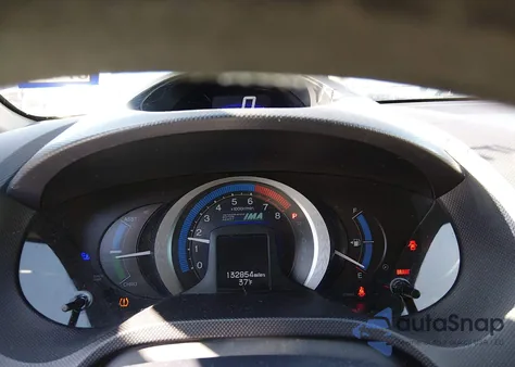 2010 Honda Insight Lx z USA, uszkodzony, nr VIN JHMZE2H51AS042038